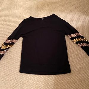 Black sweater with sequins on the sleeves
